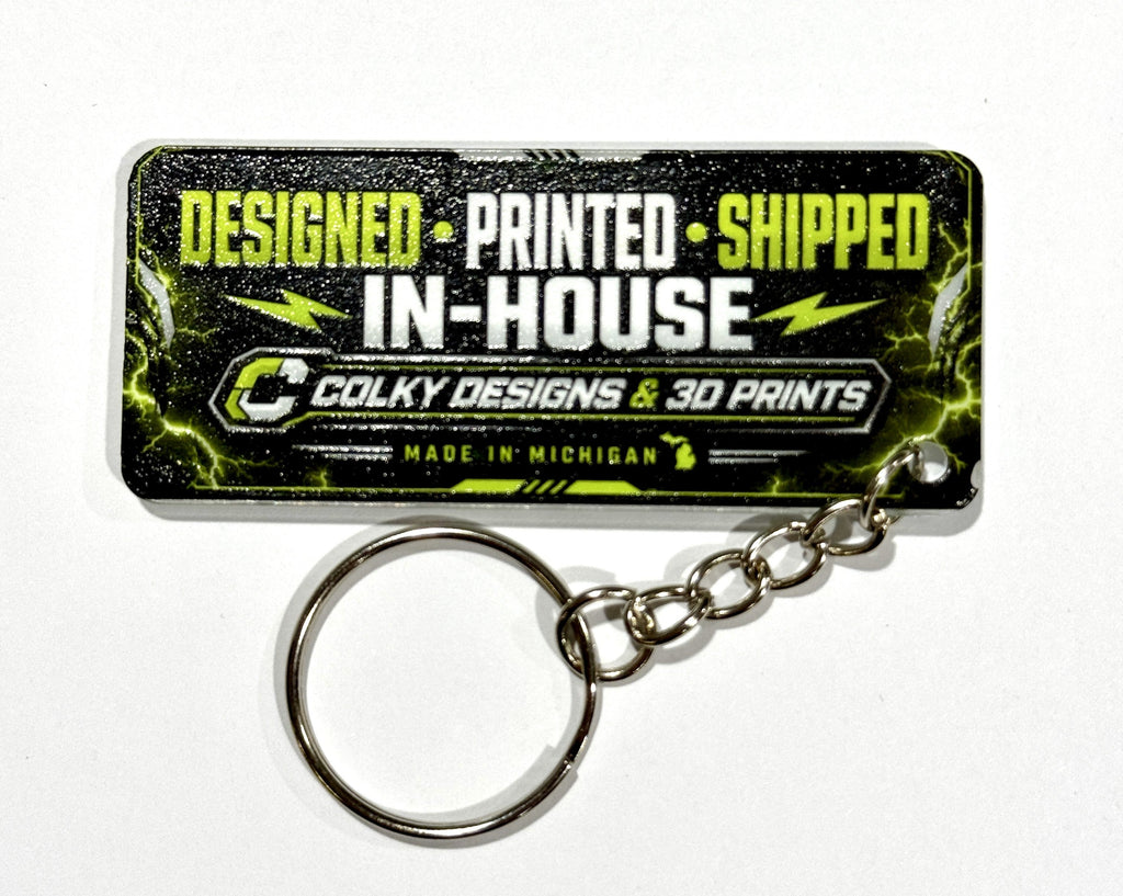 UV-printed clear acrylic keytag, 70 x 30 mm, with chain and split ring